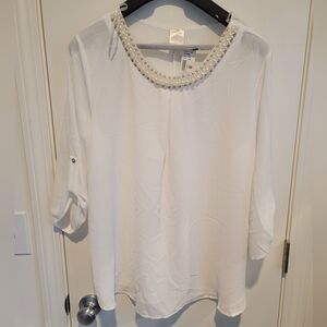 Beautiful white blouse with pearl neckline